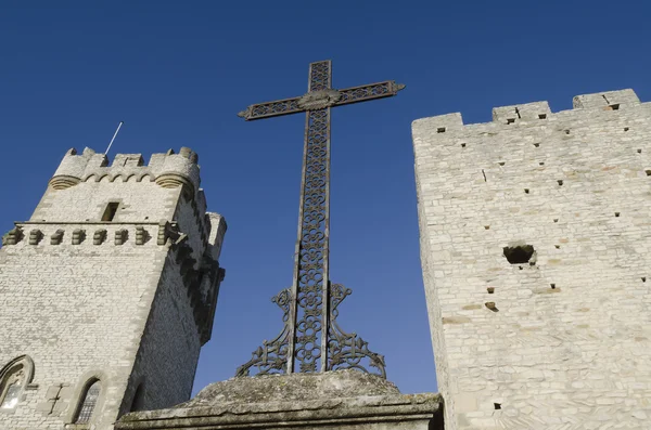 Christian cross between two medieval towers — Stock Photo, Image