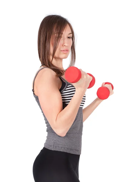 stock image Woman with dumbbell in hand