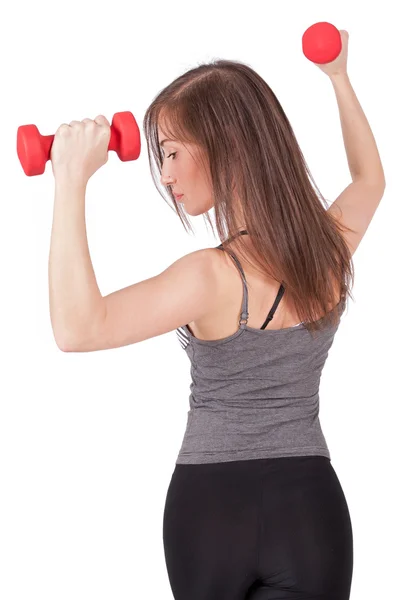 stock image Woman with dumbbell in hand