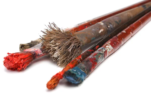 Oil paints palette and paint brushes — Stock Photo, Image