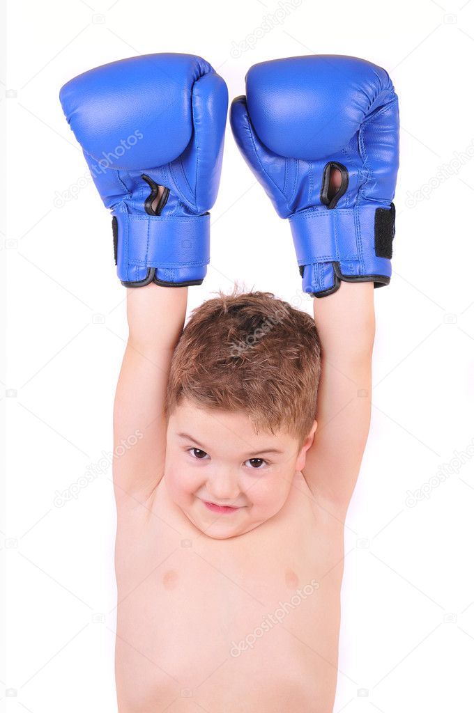 Boy with boxing gloves on white background