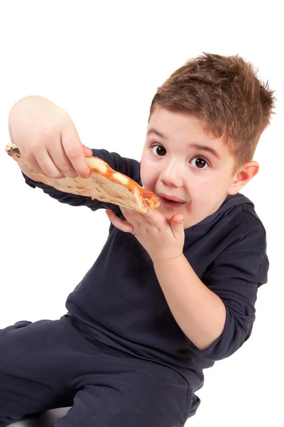 Chico comiendo pizza — Foto de Stock