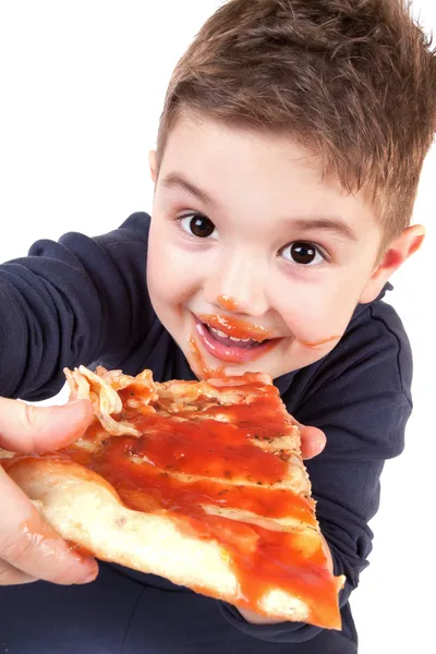 Rapaz a comer pizza Fotografias De Stock Royalty-Free