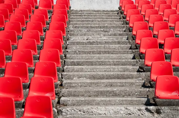 Red stadium seats on the stand — Stock Photo, Image