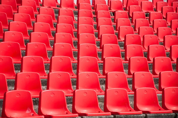 stock image Red stadium seats on the stand