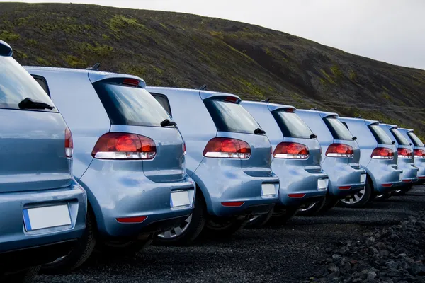 Cars parked in a row — Stock Photo, Image