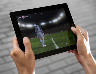 Play FIFA football on Apple Ipad2 clipart