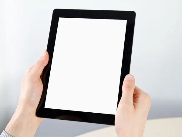 Gospodarstwo elektronicznych typu Tablet w ręce — Zdjęcie stockowe