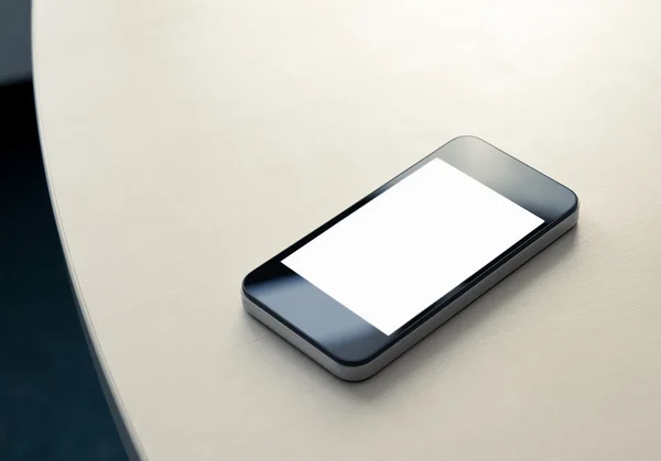 Mobiele smartphone op tafel — Stockfoto