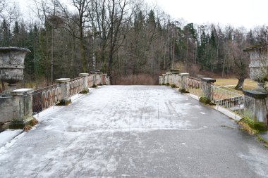 The bridge through the river the Slav in Pavlovsk park clipart