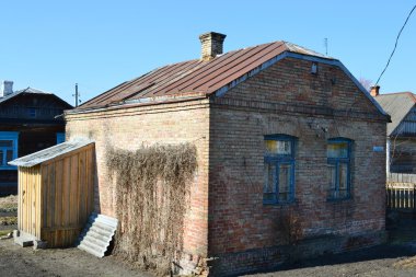 View of old rural brick house clipart