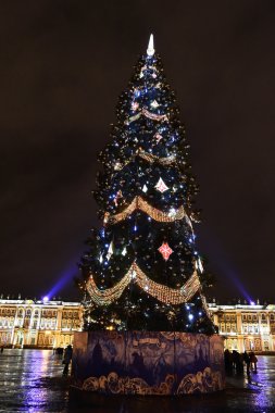 Christmas tree on the Palace Square at night clipart