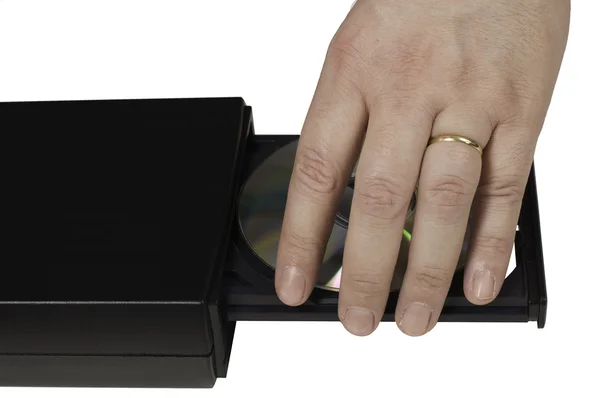Χέρι, τοποθετώντας ένα cd σε ένα δίσκο 1 — Φωτογραφία Αρχείου