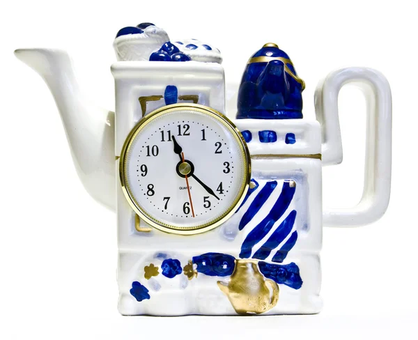 Panela de chá com um relógio — Fotografia de Stock