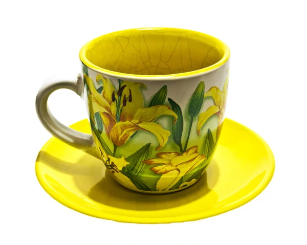 Cup with yellow lilies — Stock Photo, Image
