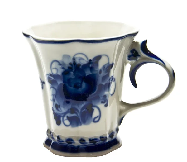 Белая чашка с синей картиной — стоковое фото