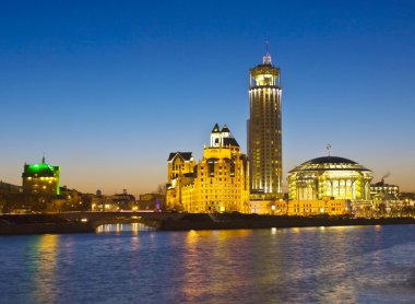 Moscow, modern buildings at night clipart