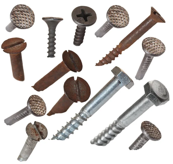 Old metal nail and screw head isolated on white — Stock Image Old metal nail and screw head isolated on white Royalty Free Stock Photos