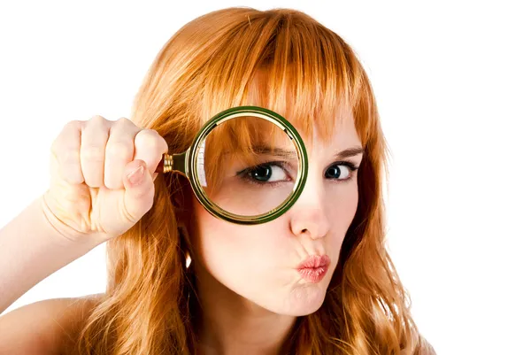 戴放大镜的女人 免版税图库图片