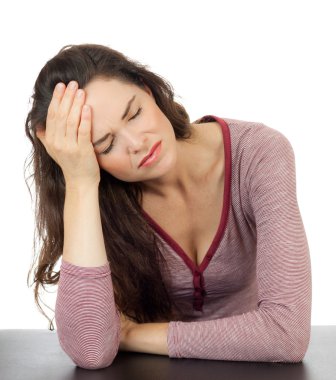 Beautiful woman with terrible headache clipart