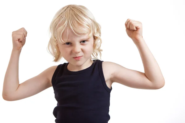 Young boy flexing muscles — Stock Photo, Image