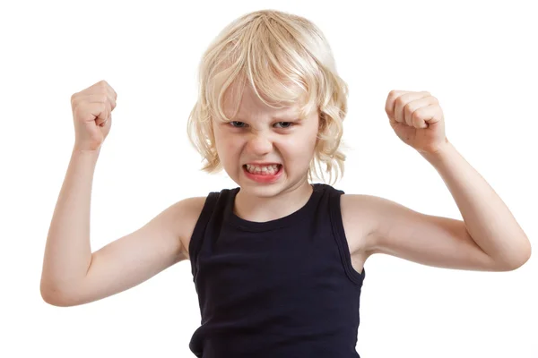 Mean looking boy flexing muscles — Stock Photo, Image