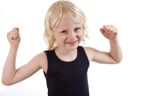 Cute boy flexing muscles — Stock Photo, Image