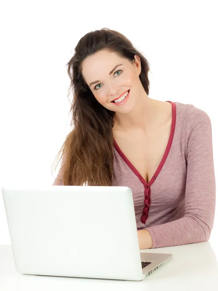 Attractive woman using a laptop — Stock Photo, Image