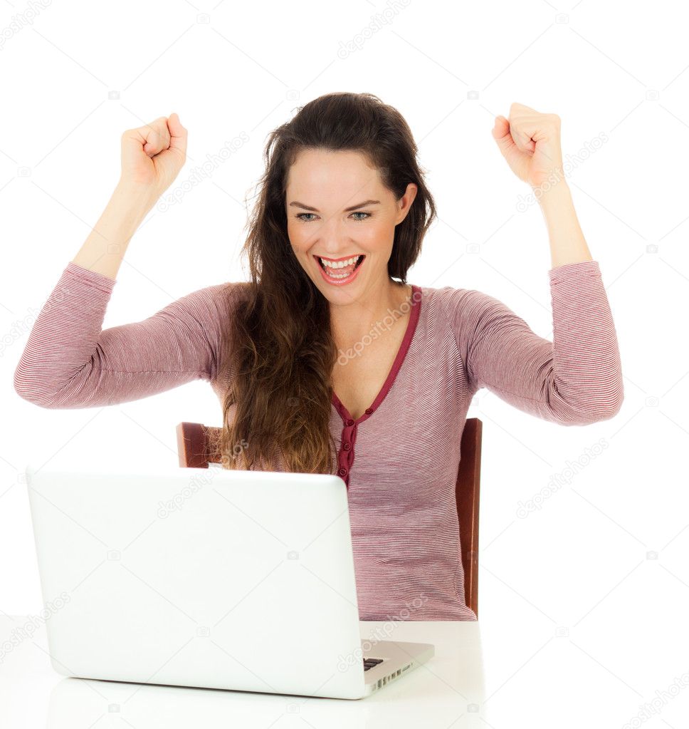 Portrait of happy female using laptop