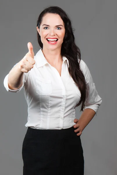 Happy woman giving thumbs up — Stock Photo, Image