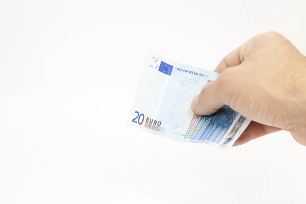 Biljet van 20 euro in zijn hand — Stockfoto