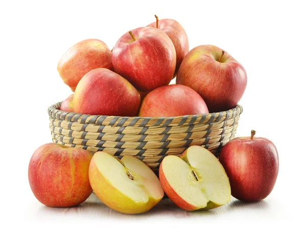 Composition with apples in basket isolated on white — Stock Photo, Image