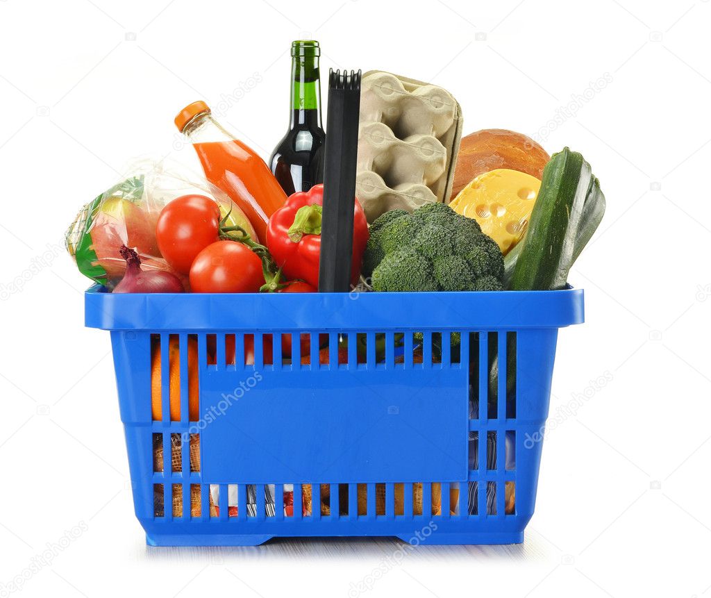 Shopping basket and groceries isolated on white