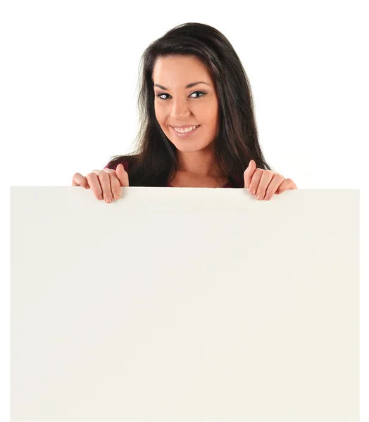 stock image Young smiling woman holding a blank board isolated on white