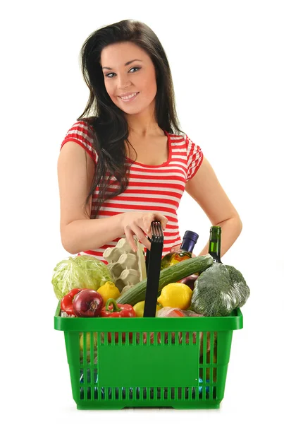 Young woman with shopping basket isolated on white — Stock Photo, Image