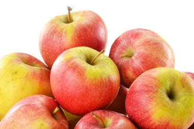 Composition with apples in basket isolated on white clipart