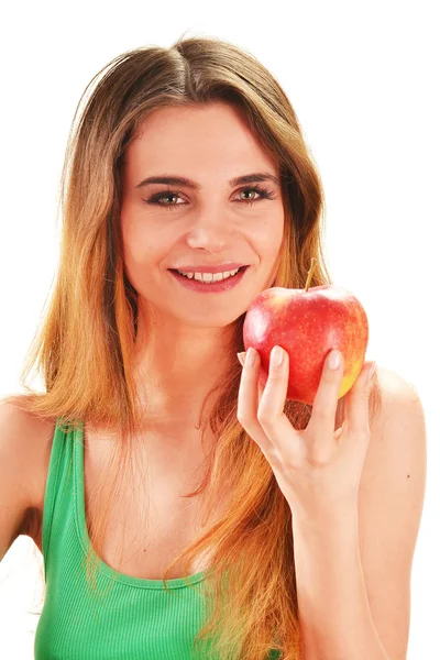 Νεαρή όμορφη γυναίκα, κρατώντας ένα κόκκινο ώριμο μήλο στο χέρι — Φωτογραφία Αρχείου