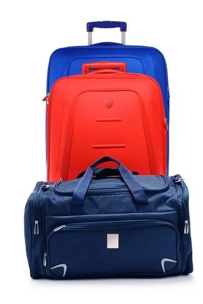 Gepäck bestehend aus großen Koffern isoliert auf weiß — Stockfoto