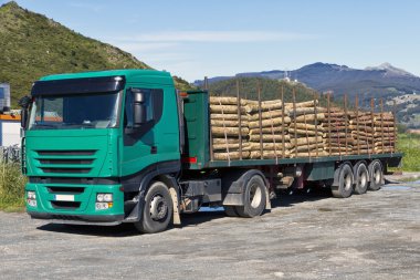 Truck transporting logs clipart