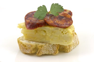 Spanish omelette with chorizo ??Iberico clipart