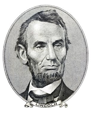 President Abraham Lincoln as he looks on five dollar bill obverse clipart