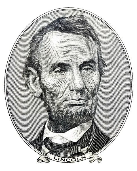 Präsident Abraham Lincoln blickt auf die Vorderseite des Fünf-Dollar-Scheins Stockbild
