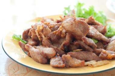 Fried pork on dish