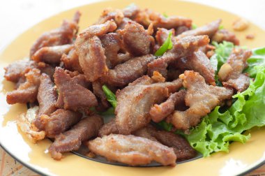 Fried pork on dish