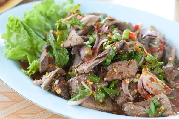 Thai sweet liver salad on dish — Stock Photo, Image
