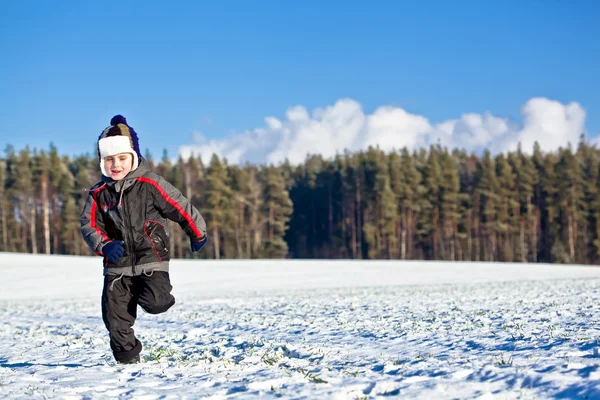 Running kid in winter — Stock Fotó