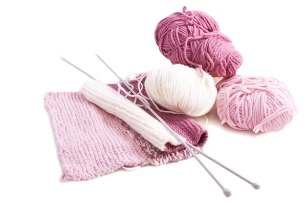 Pletení s růžovou a bílou vlnou — Stock fotografie