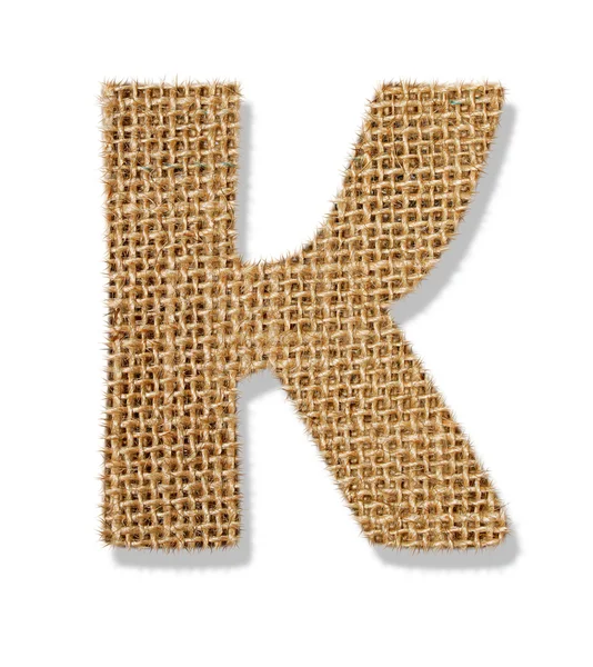 The letter "K" is made of coarse cloth. — Stock Photo, Image