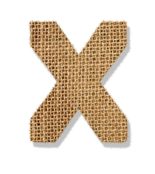 The letter "X" is made of coarse cloth. — Stock Photo, Image
