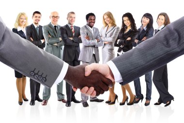 Shaking hands and business team formed of young businesspeople clipart